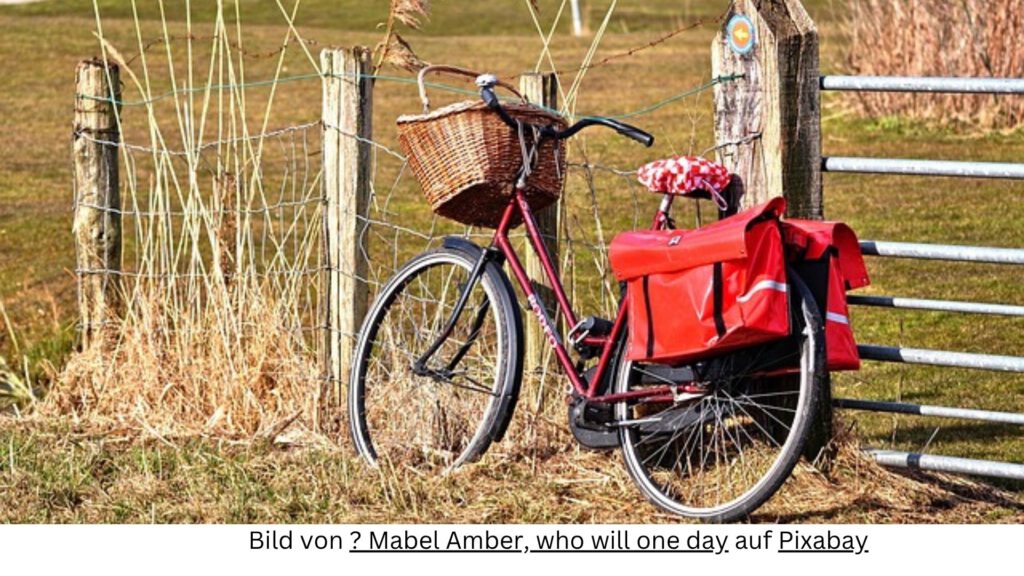 Fahrrad im Feld mit Piknik-Korb