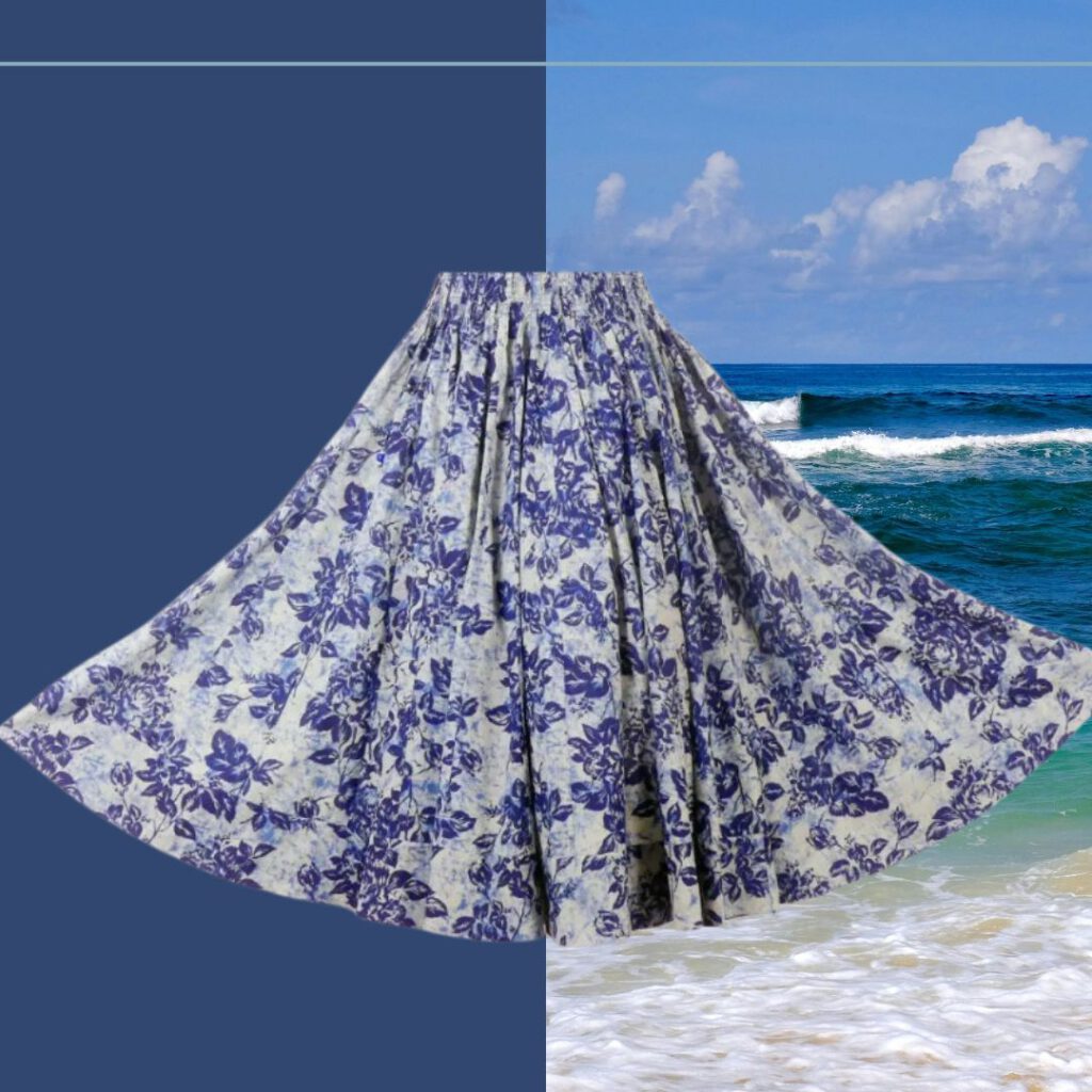weiter Rock mit blauem Blumenmuster auf Weiß